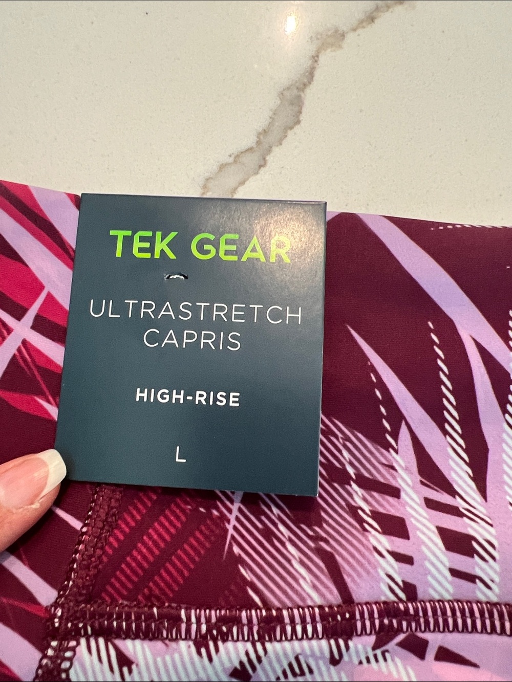 Double pocketed Tek Gear Pink and Burgundy Palm-Print Capri yoga pants - Picture 6 of 7